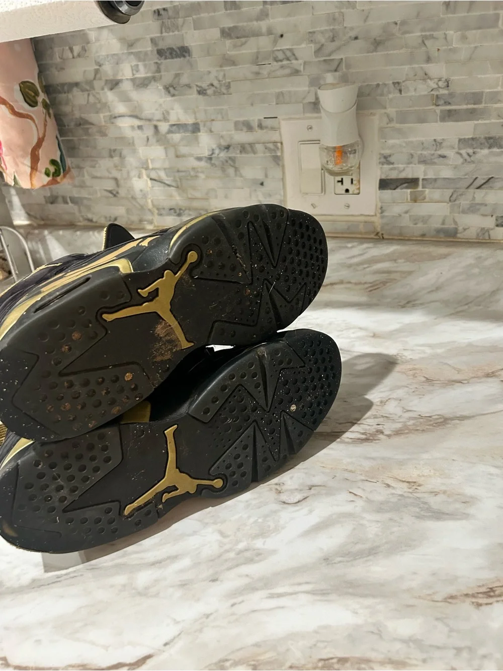 Jordan Black and Metallic Gold High-Top Sneakers